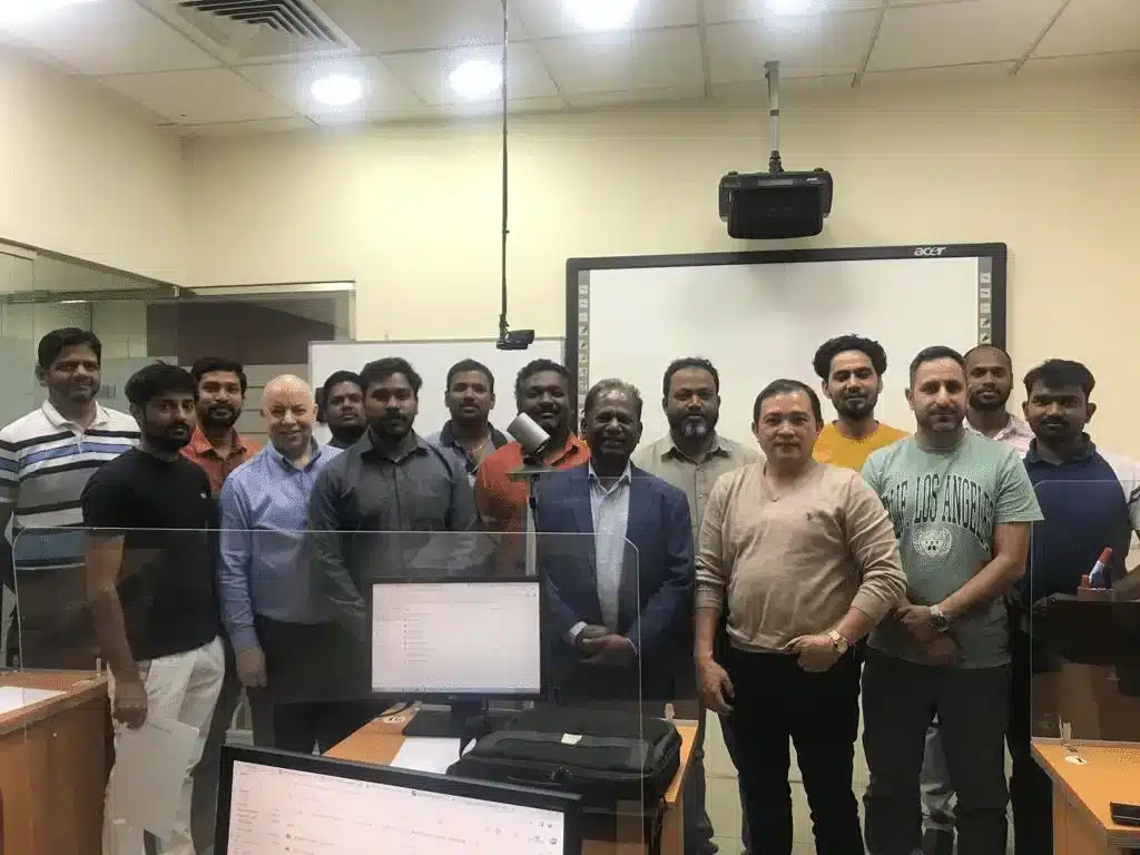 Group of course participants with their trainer at Green International
